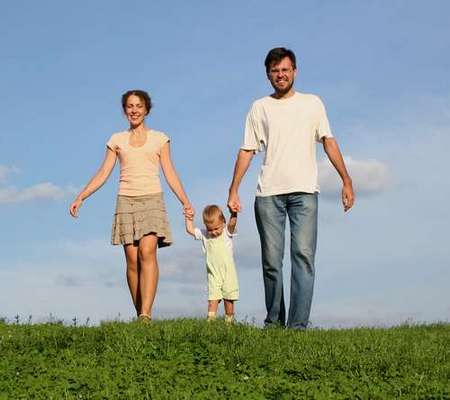 Parents with child outdoors